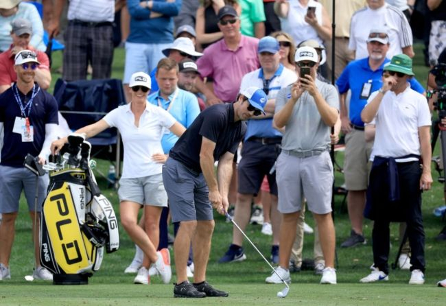 PGA Tour Caddie Flips 8 Iron Upside Down Hits 17 Green At TPC Sawgrass  - Pga Tours Big Easy Crossword